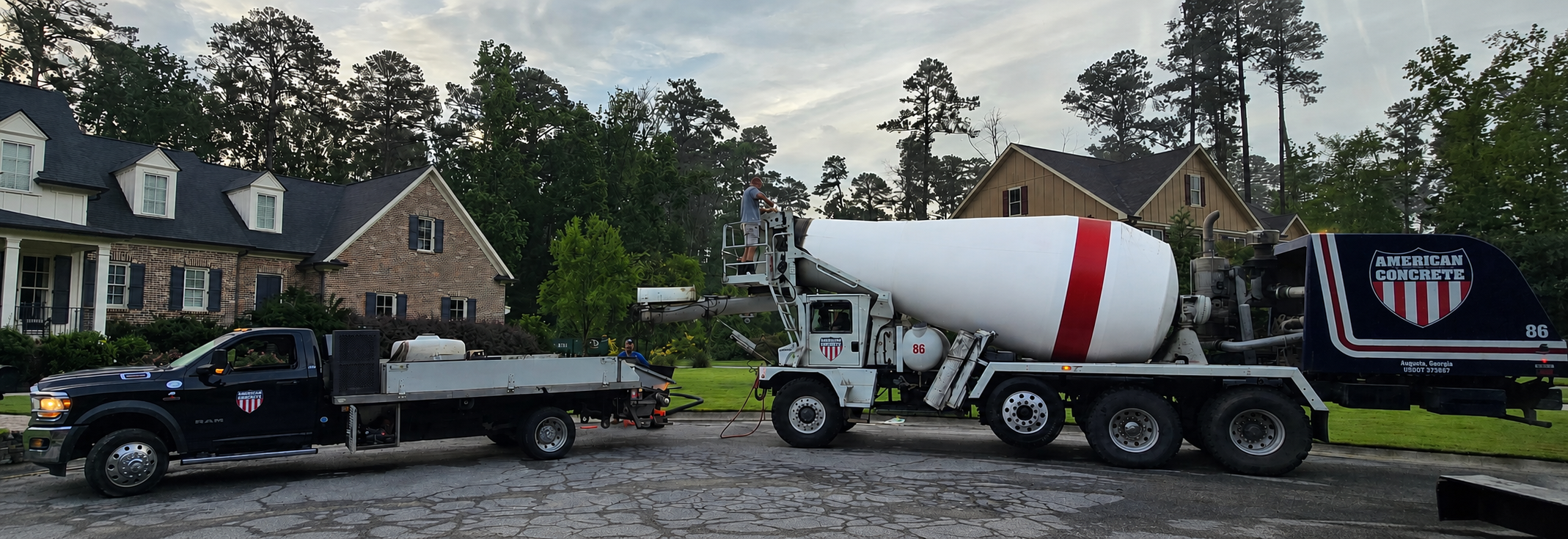 American Concrete Line Pump Truck parked outside a residential concrete project